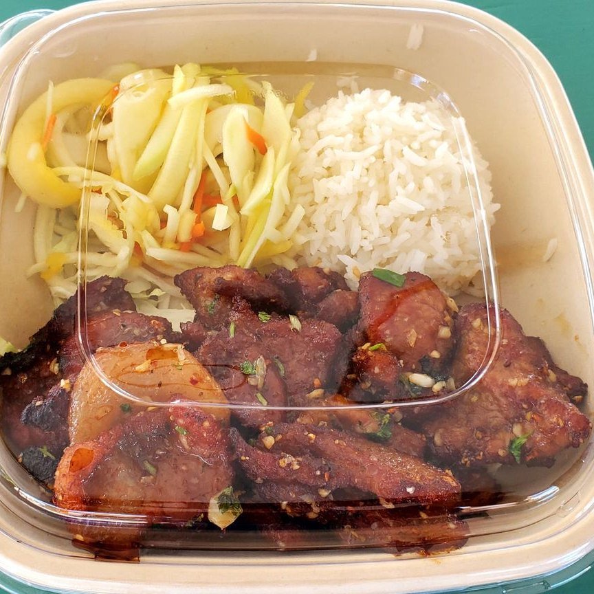 Grilled pork with green mango slaw and rice